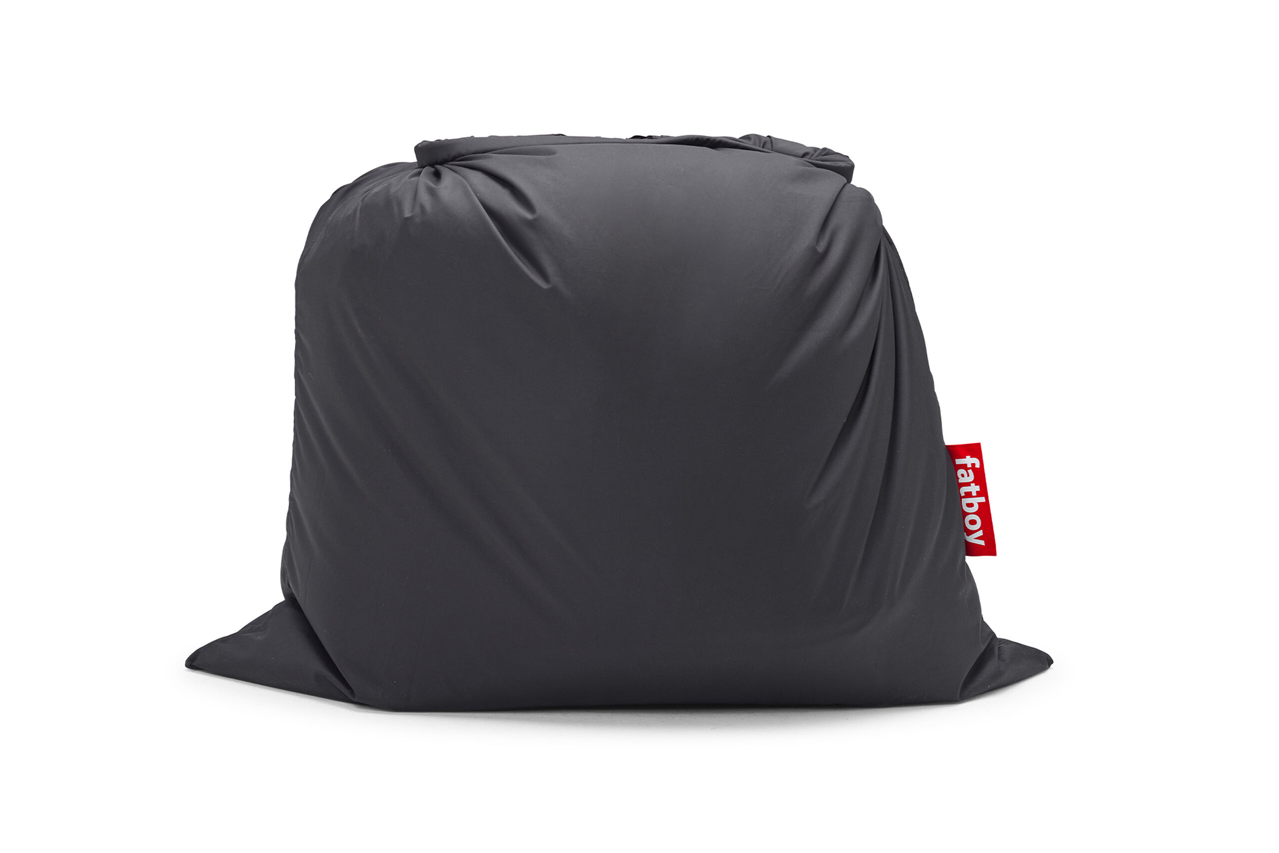 Side view of a dark gray Fatboy bean bag cover with a red Fatboy tag